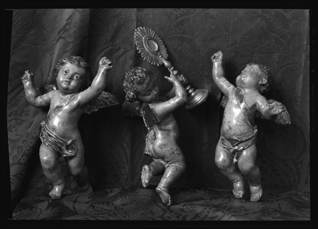Tres angelitos de la escultura de Santa Bárbara de la iglesia de San Antolín de Murcia, obra de Francisco Salzillo