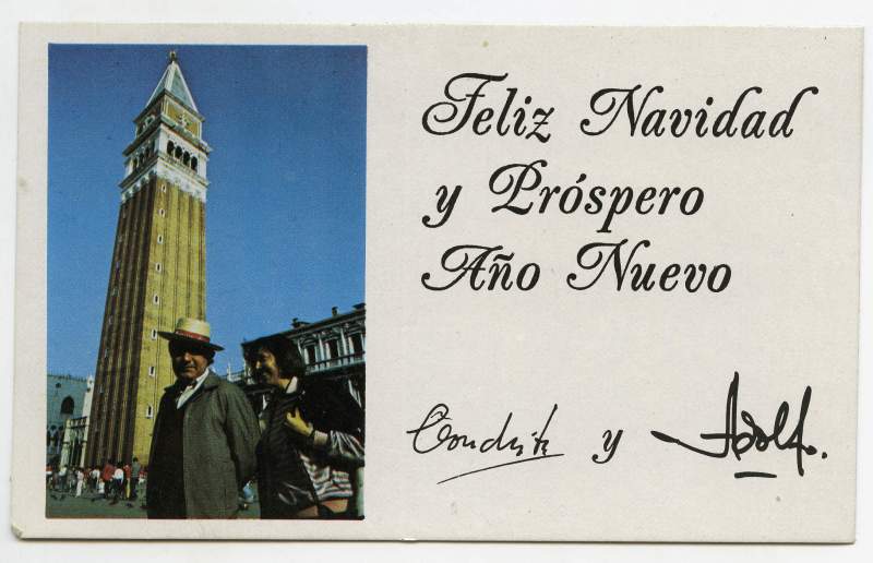 Tarjeta de felicitación de Navidad de Conchita y Adolfo, que aparecen fotografiados delante del Campanile de la Plaza de San Marcos en Venecia.