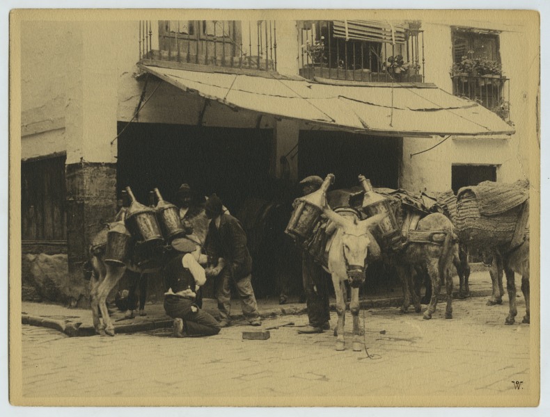 Escena costumbrista en una calle de Granada